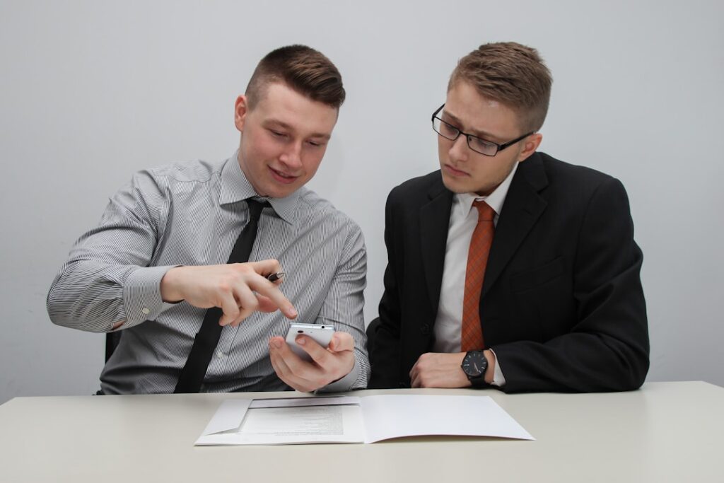 Two professionals discussing the concept of "what is project accounting" and its key principles